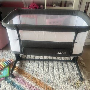 Bedside baby basinet.